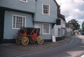 An old carriage on a street in Dorchester.